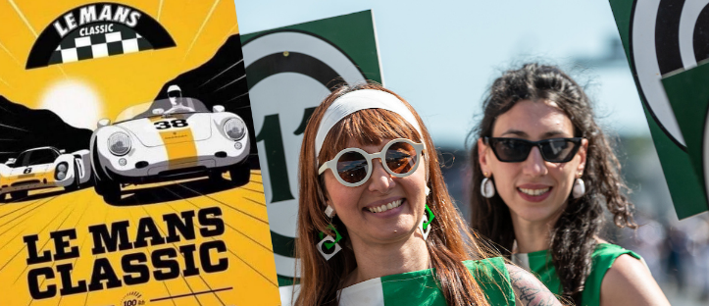 Two smiling women in sunglasses pose at a Le Mans Classic event